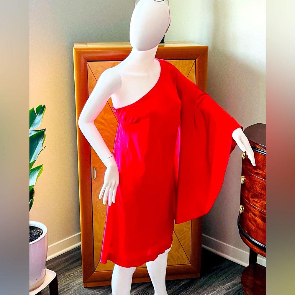 Nicole Miller, 100% silk, polyester lined dress.